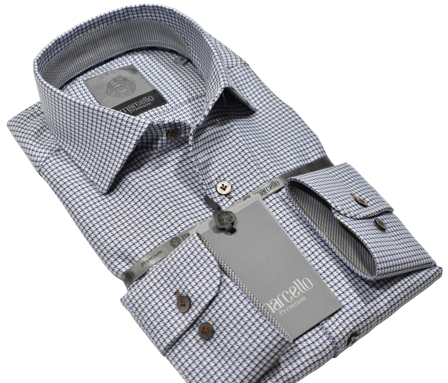 Elevate your wardrobe with the Marcello Premium Hartford Neat Tag shirt. Crafted from extra fine fabrics sourced from fine Italian mills, our Marcello Premium program offers 100's 2 ply shirts in rich classic patterns. With the Marcello exclusive one piece roll collar, you'll feel confident and stylish in any setting.