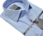 Elevate your wardrobe with the Marcello Premium Classic Blue Neat shirt. Crafted from extra fine fabrics sourced from fine Italian mills, our Marcello Premium program offers 100's 2 ply shirts in rich classic patterns. With the Marcello exclusive one piece roll collar, you'll feel confident and stylish in any setting.