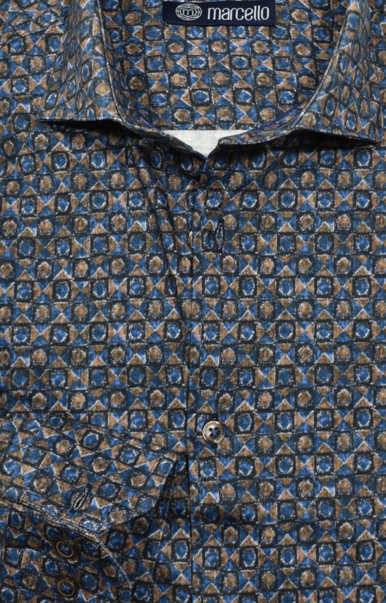 Marcello Mocha Diamond Stretch, where stunning geometric patterns in rich mocha and deep indigo create an eye-catching statement