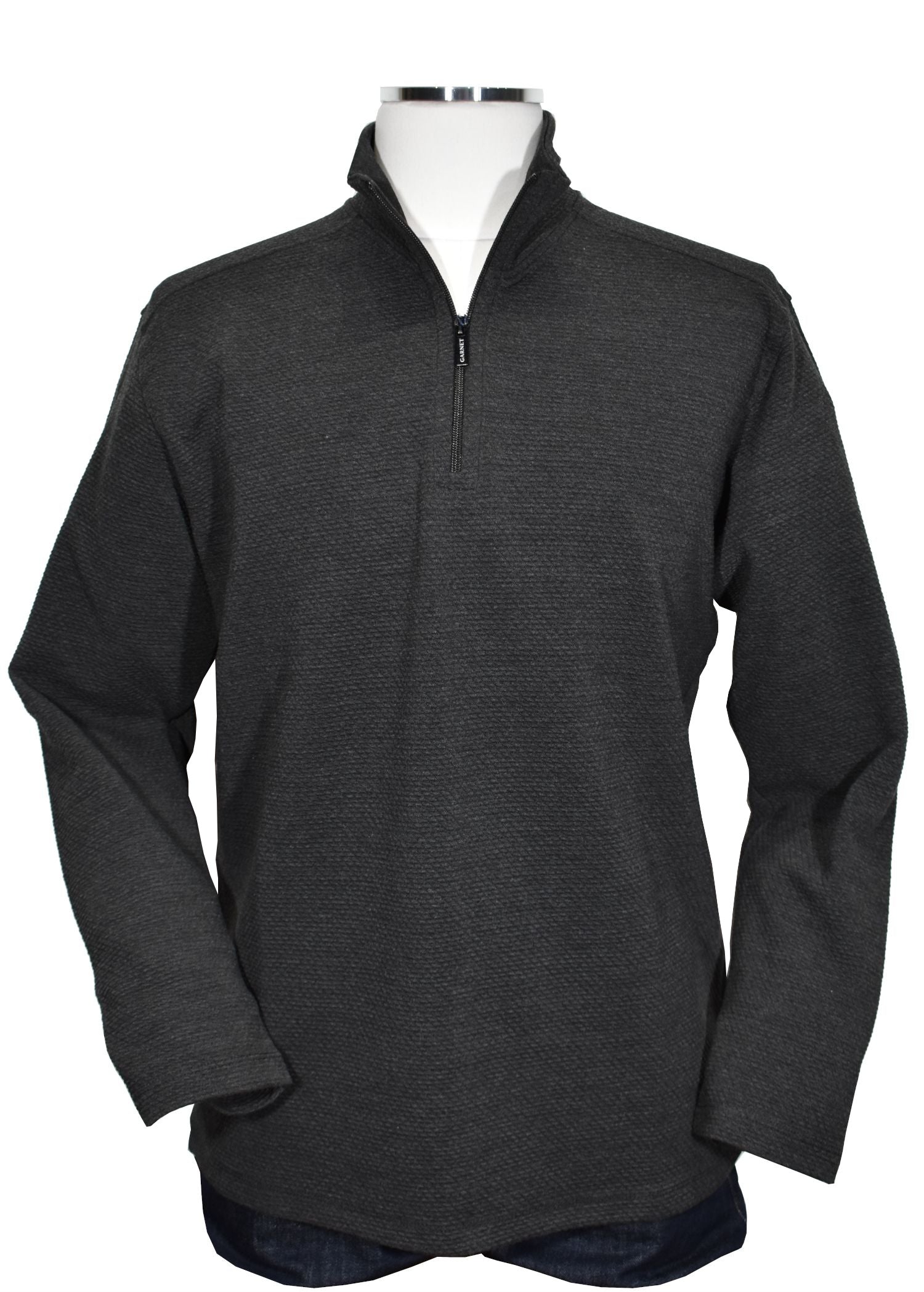 Feel luxurious and cool in this ZA26006 Lux Tech Pullover! Our tech fabric is lightweight yet soft and velvety, and your look will be elevated with its subtle two-color weave and slight contrast. With its classic soft-sided zip mock model and open bottom and sleeve, you'll be sure to make a contemporary statement!