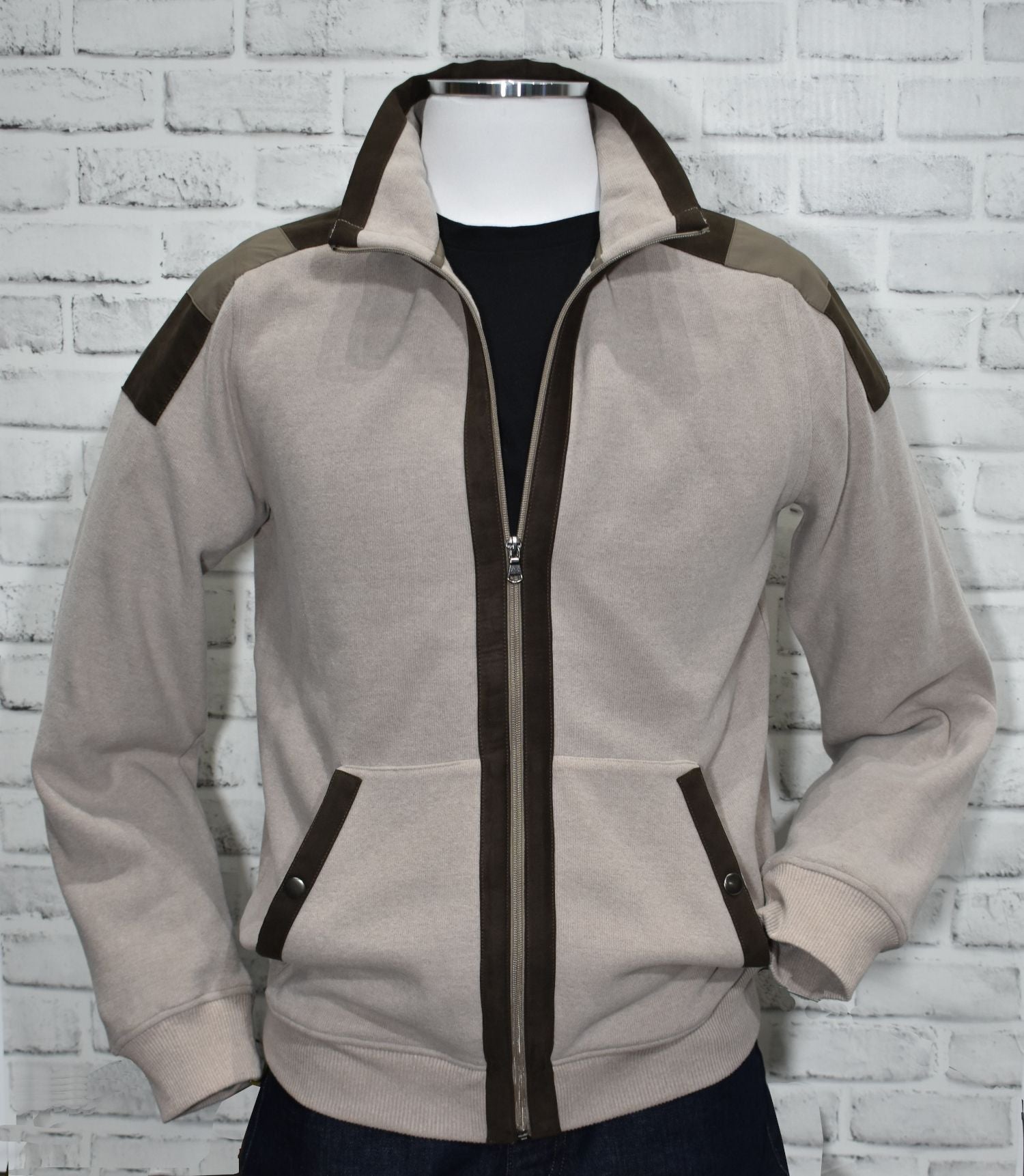 Unmistakably stylish, the Espana Leisure Jacket is crafted from a luxuriously comfortable poly cotton fabric, with a modern fit perfect for a slim to medium build. The jacket is finished off with classic pockets and chocolate and tan alcantara suede trim, for a sleek, sophisticated look. Cool comfort at its finest.