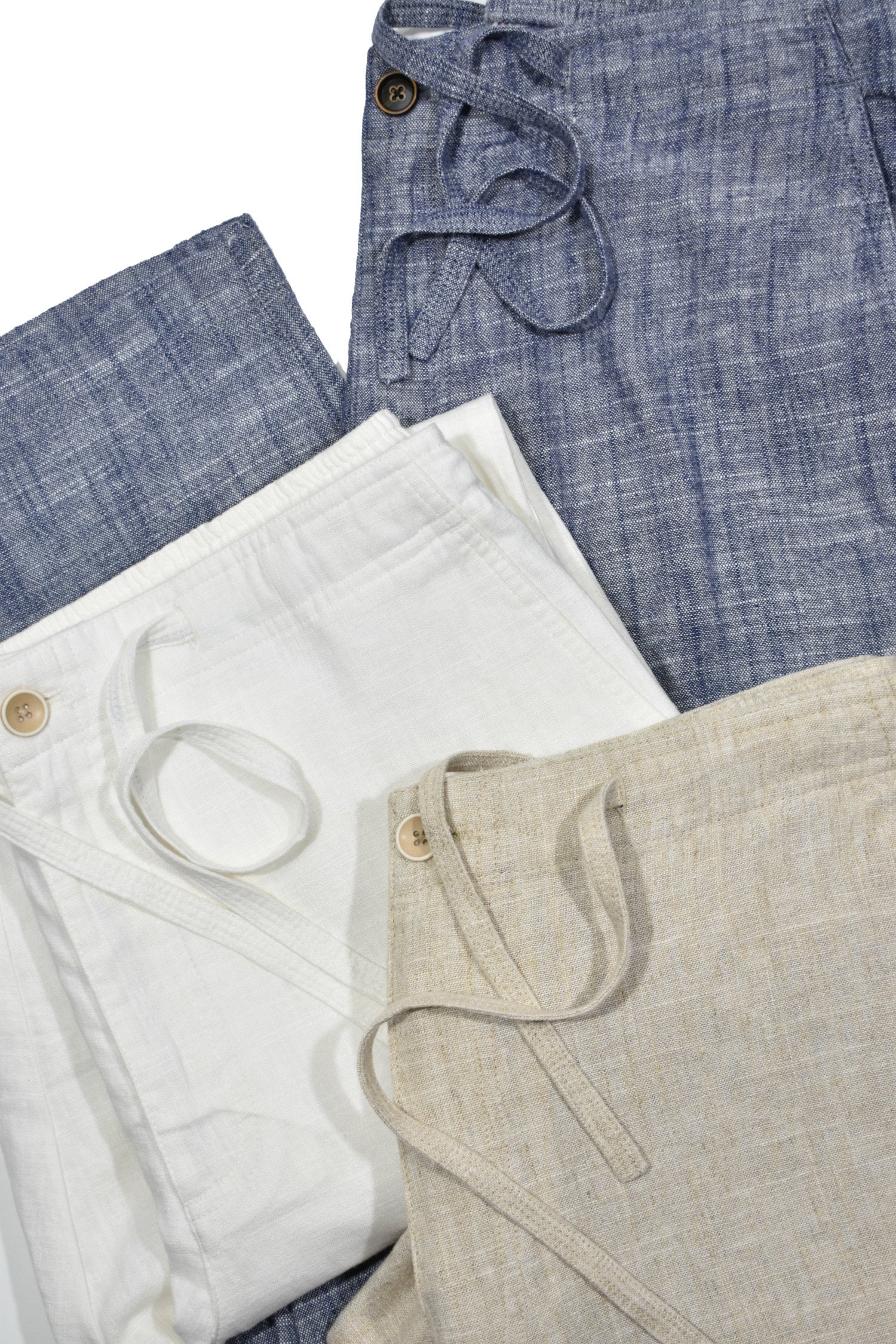 Soft washed 60% pure linen and 40% viscose feels great to the touch and has the characteristic look of linen without the negative attributes.  Draw string comfort waist with built in half stretch along the back, side slash pockets and two rear button through pockets.