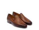 Pair of Magnanni Herrera Cuero brown woven leather loafers, shown at a three-quarter angle on a white background.