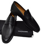  Rich Spanish leather in a pebble grain sporting a classic penny loafer model for the perfect anytime shoe. 