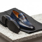 Magnanni navy brown flex shoe.