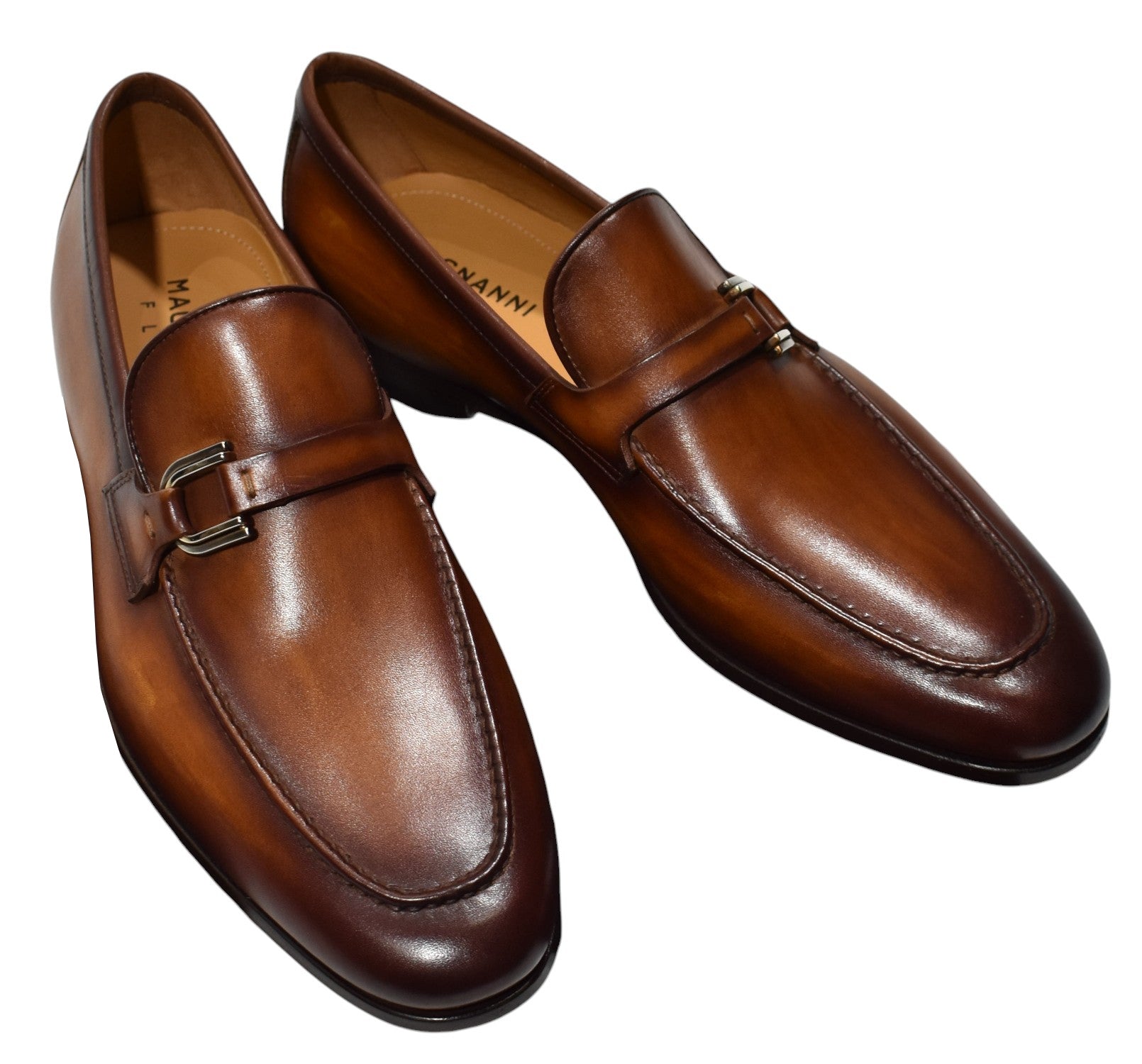 The classic dress shoe with buckle model in a rich burnished leather is perfect for dress but certainly looks great with a pair of jeans. 