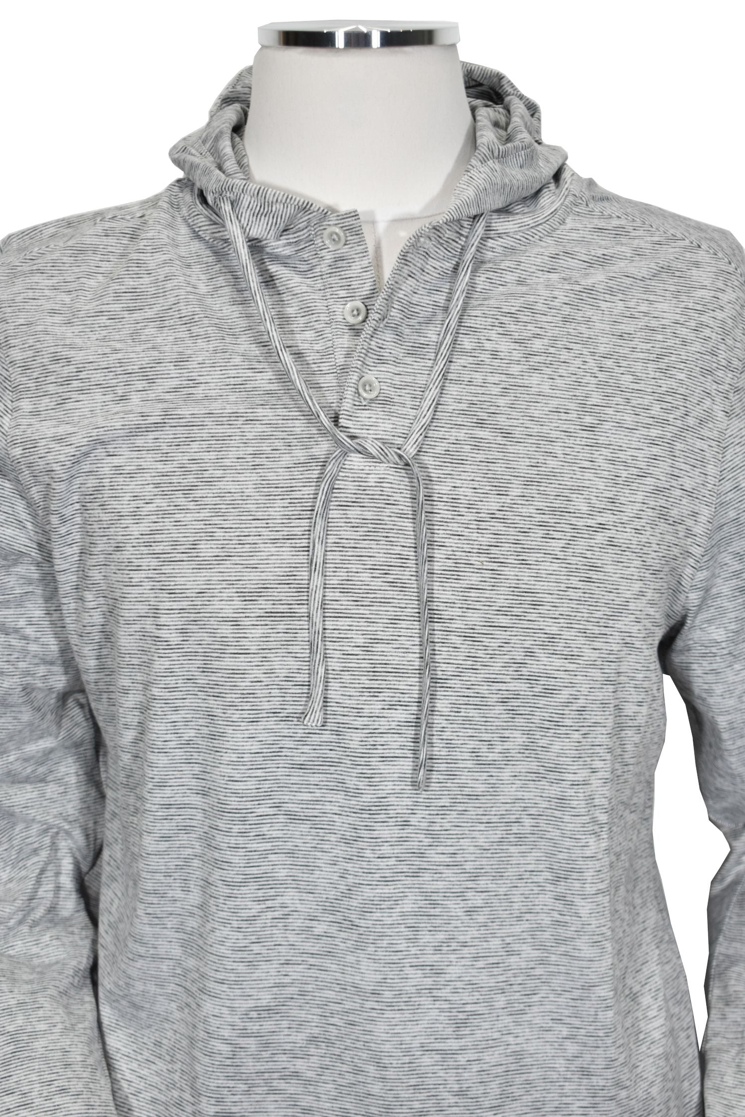 This classic fit feed stripe hoodie offers a contemporary style in a lightweight fabric with a soft, silky feel. The open sleeve and open bottom provide added mobility for all-day comfort. Available in gray or blue, it is the perfect hoodie for any occasion.  Classic fit.  Open sleeve and open bottom, super soft and a little heavier than a tee shirt. 