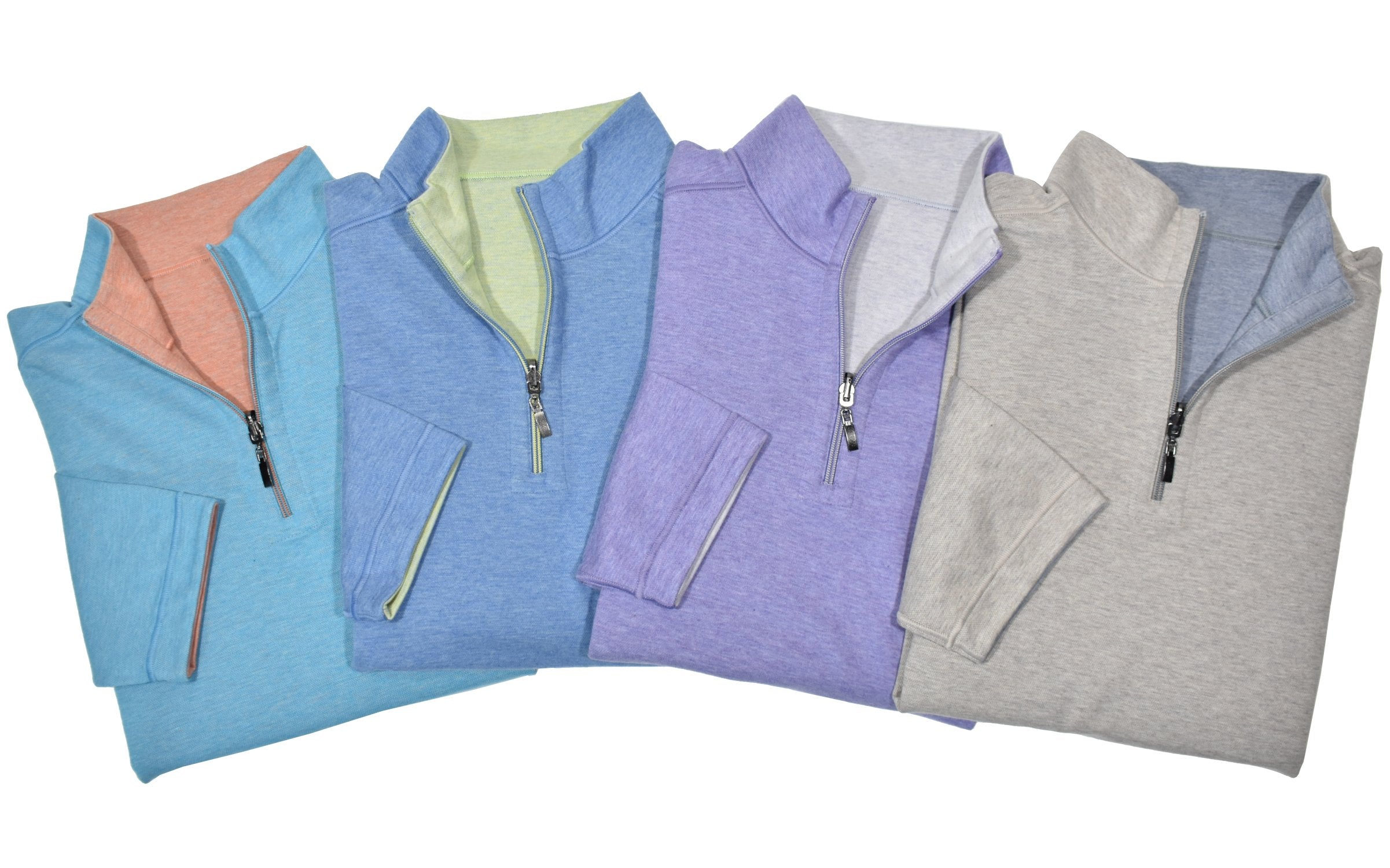 Reversible 1/4 zip is for both comfort and style. Soft and elegant polynosic performance fabric provides a comfortable fit while the classic 1/4 zip model and open sleeves offer a timeless look. The welted seams on both sides adds style.