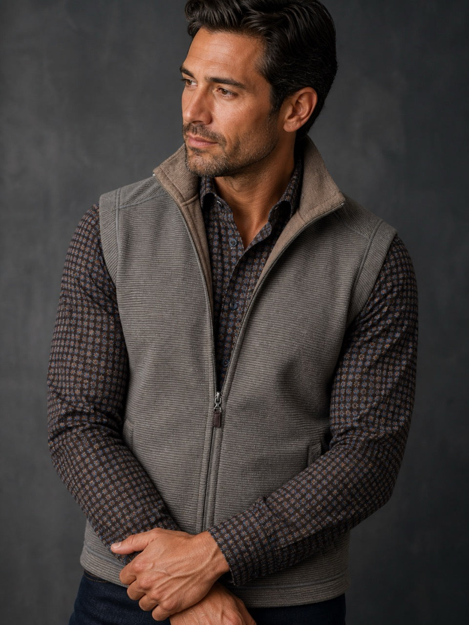Taupe reverses to camel zip vest.