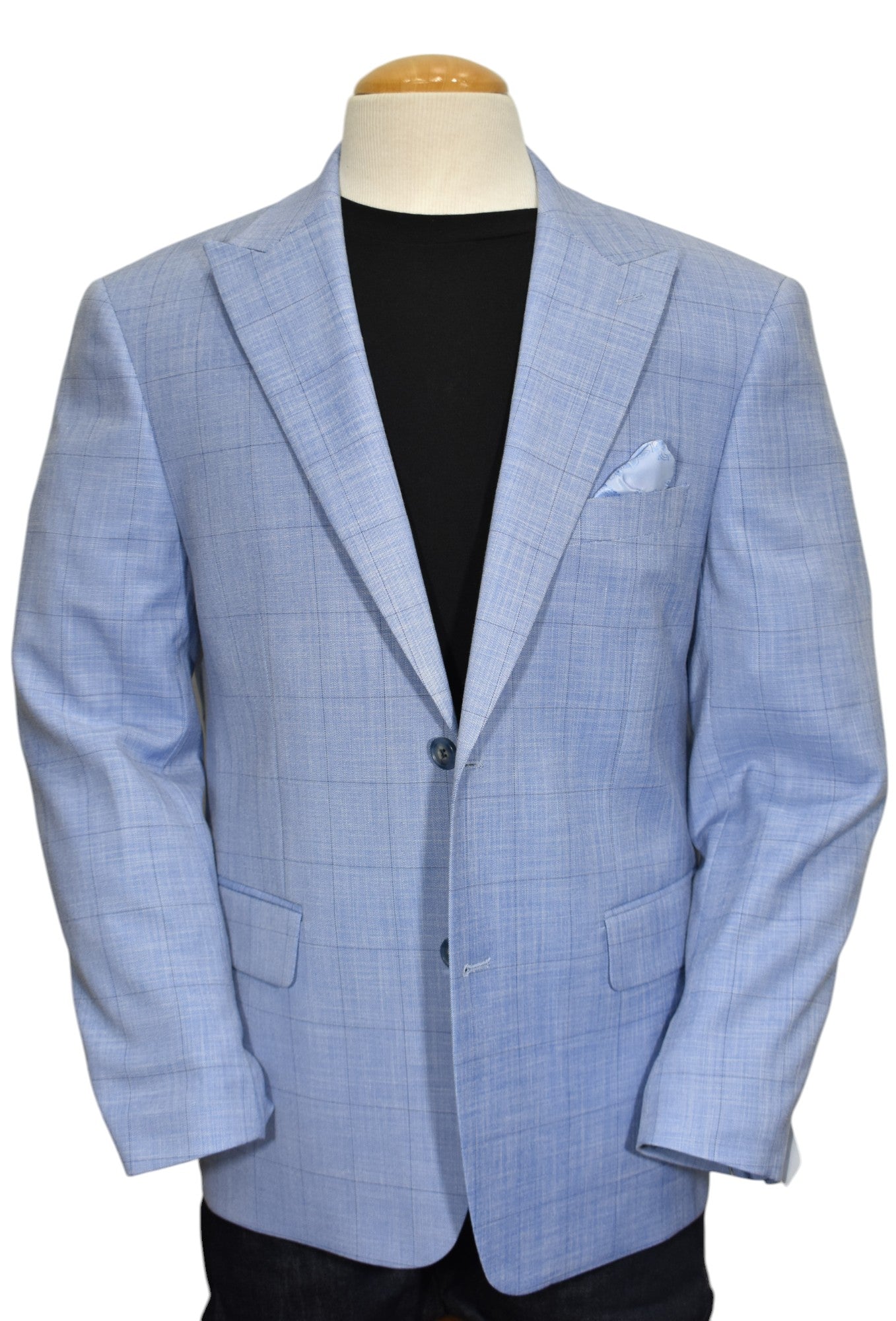 The Marcello Sky Blue Window Pane sport coat is perfect for the Spring Summer season. Its slim fit and rich blue coloration with a fine navy window pane design exudes sophistication and style. A must-have for slim to medium builds.