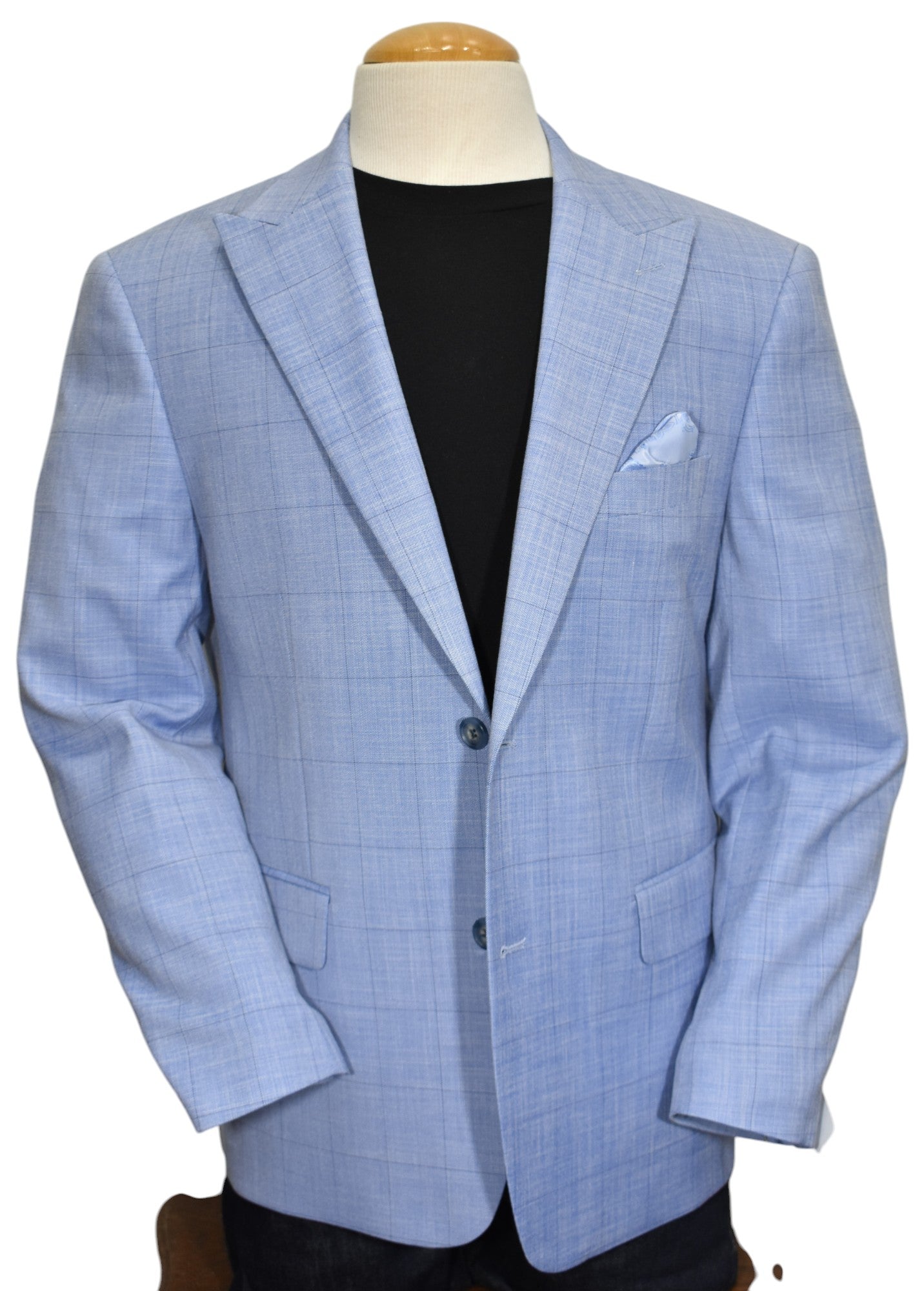 The Marcello Sky Blue Window Pane sport coat is perfect for the Spring Summer season. Its slim fit and rich blue coloration with a fine navy window pane design exudes sophistication and style. A must-have for slim to medium builds.
