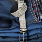 Imagine how good you will look in your favorite jeans sporting this soft, stamped leather belt.  Whether a black, grey or blue bottoms, this belt will work perfectly and look great.