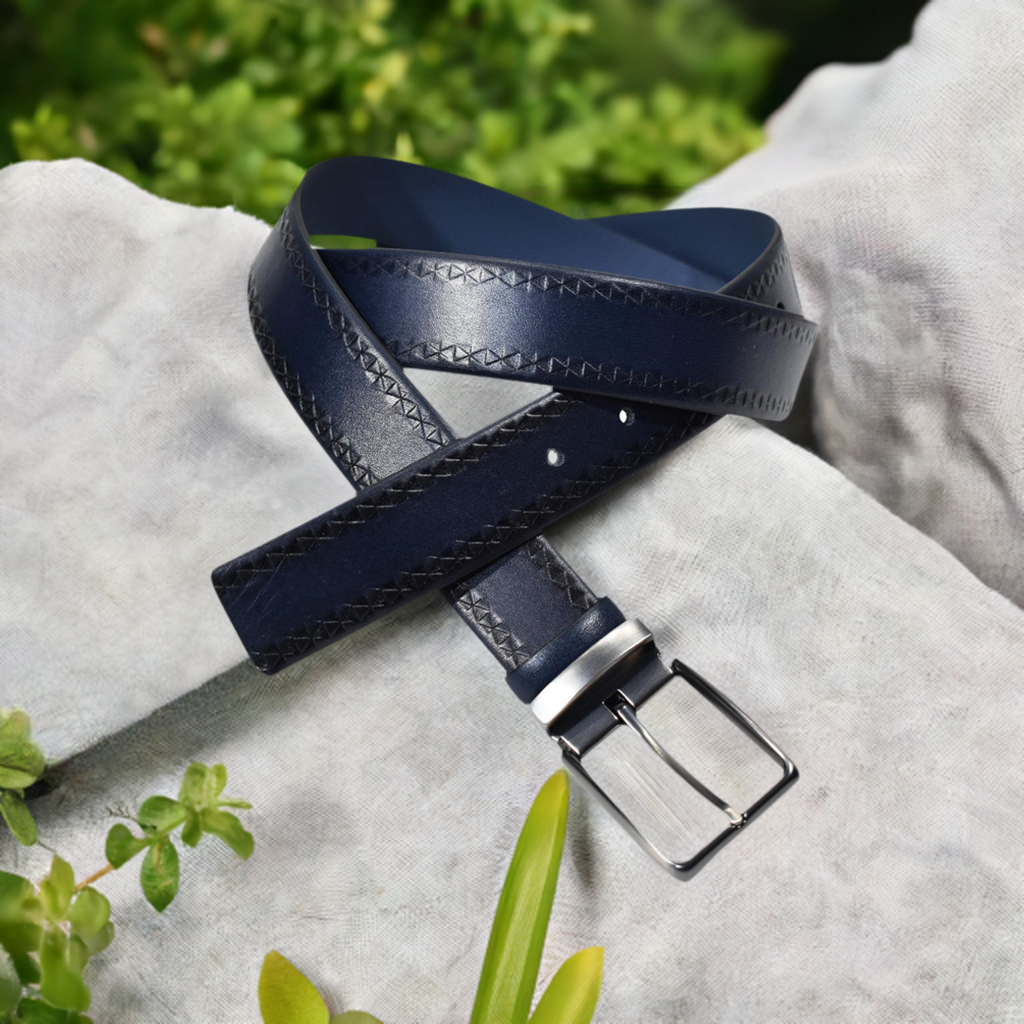 Marcello deep indigo leather belt looks perfect to dress up your favorite jeans.    Soft leather. Brushed metal buckle.