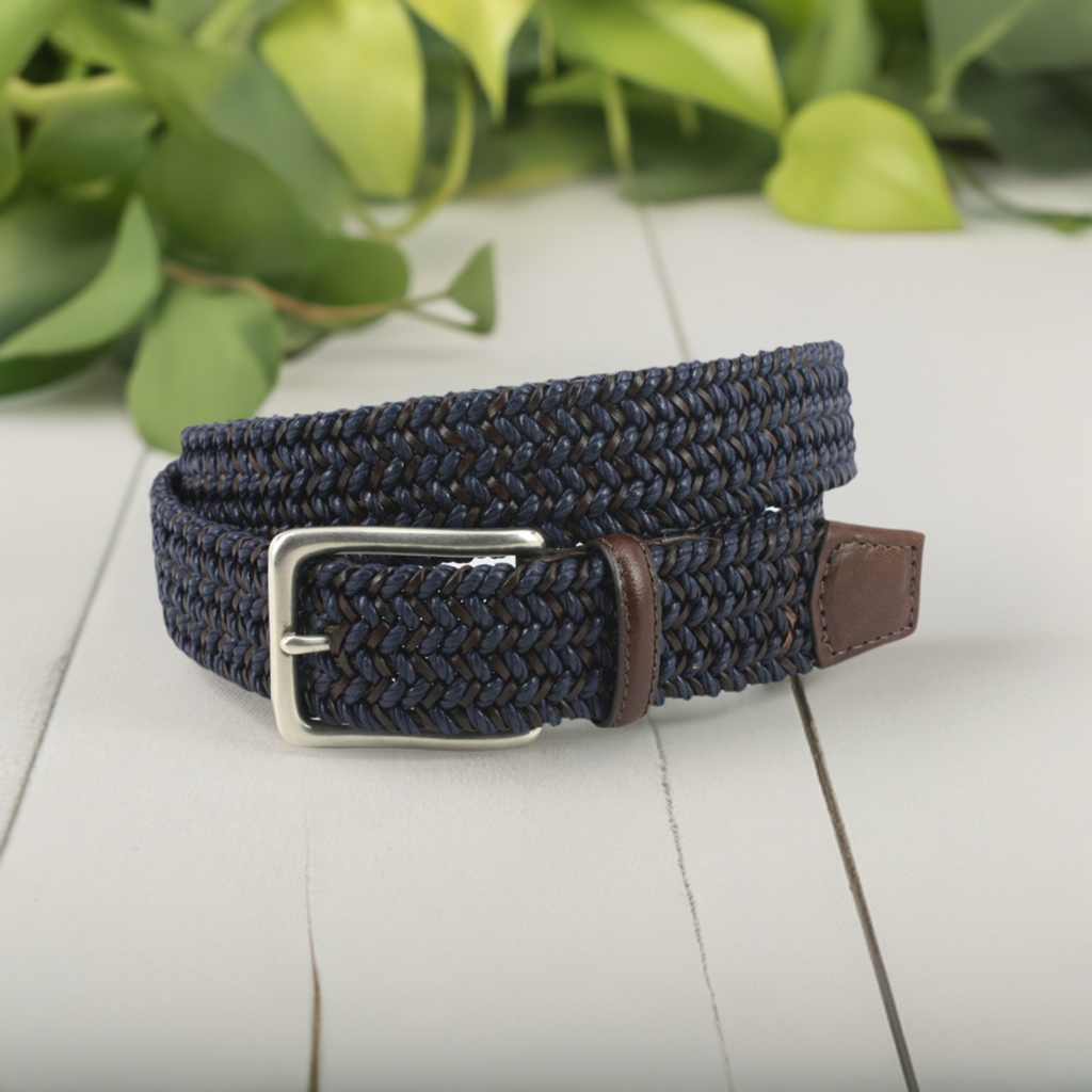 Look and feel your best with the Torino Italian Stretch belt. Crafted in Italy with a fabric intertwined weave and assembled in America, this navy and chocolate mixed color belt offers the perfect combination of classic styling, fit and added comfort. Stay stylish and comfy wherever you go.