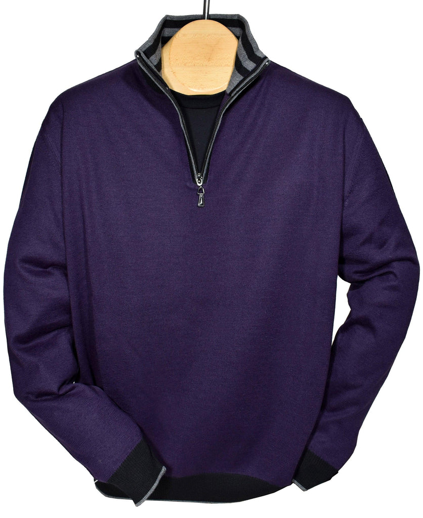 The engineered detailing, along with an outstanding light weight hand feeling, make this one of the finest zip mocks you will find. Available in Navy or Plum. Extra fine, lightweight, merino wool blend. Perfect weight for layering or under a sport coat. Engineered style creates a cool, contemporary image. Classic ribbed cuffs and waist band with contrast colors. Classic fit.