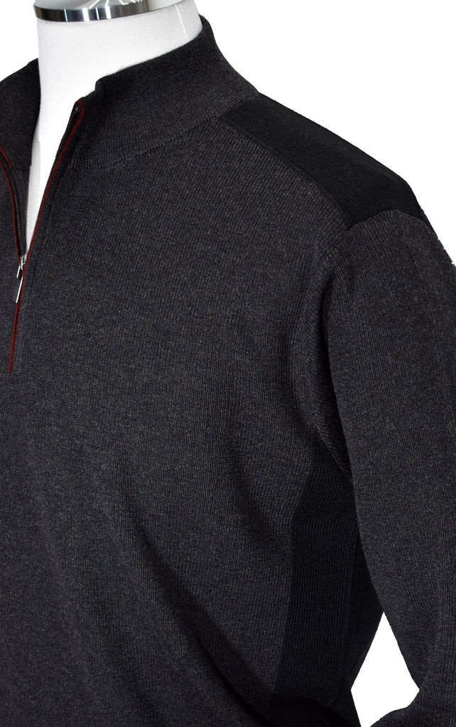 Elegant, yet sporty, the classic zip mock boasts a soft, Italian merino wool blend fabric that is light weight.  The rich charcoal color with black panel accents and a fine wine accent along the zipper creates a dignified look whether worn over a sport shirt or layered under a sport coat.   Rich Italian merino wool blended yarns.  Classic fit and classic ribbed cuffs and waist band. By Marcello Sport