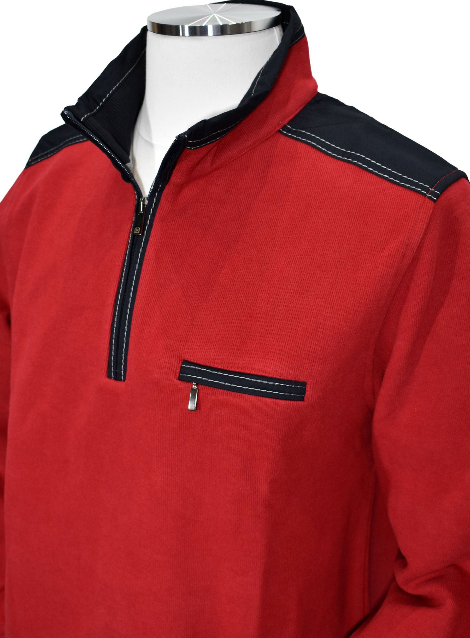 Cotton based fabric in a light to moderate weight, with contrast fabric detailing, and further accented with contrast stitching.   Great for an active lifestyle or just the image of an active or nautical lifestyle.   Soft mock neck model for added comfort with classic ribbed cuffs and waist band.  Classic fit.  Red color, by Marcello Sport.