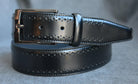 Pants or jeans are perfect for this perforated belt on glove leather. Soft glazed, polished buckle.   Men's edge embossed belt by Marcello Sport in Black.  Italian leather. Satin nickel finished buckle. Perfect look for a dressy style. Available in Black or Cognac. Imported.
