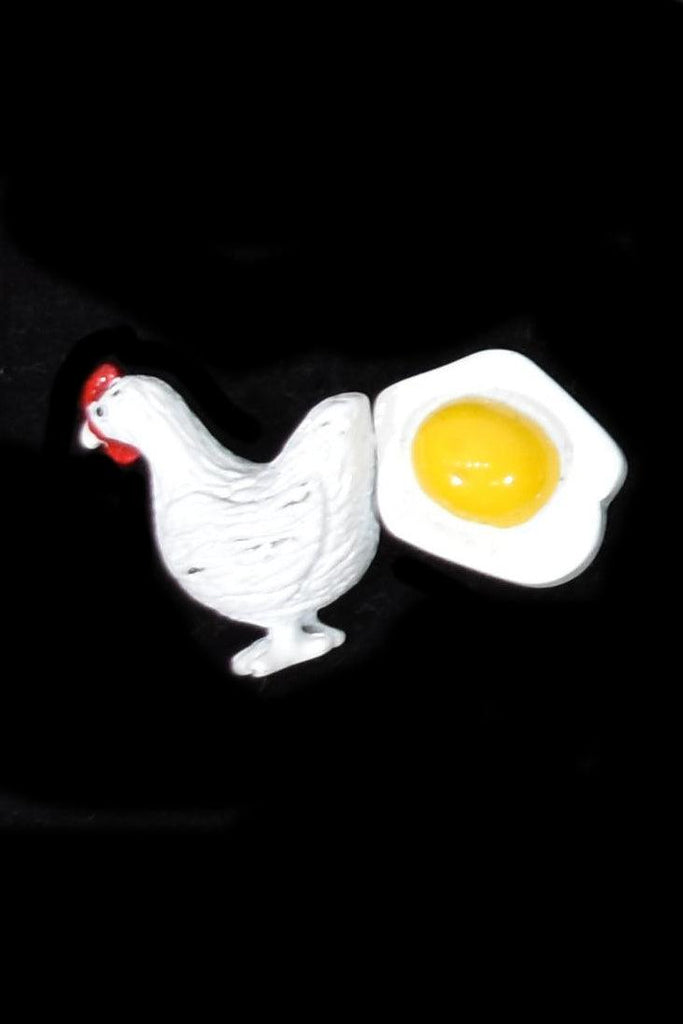 Chicken and egg cufflinks.