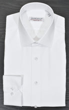 Look no further for an exceptional dress shirt with a fine tone on tone herringbone fabric.  The pattern, along with the luxe fabric, creates a dignified and rich look to compliment any sport coat or suit. Extra fine, soft Italian cotton, is easy care. Ultra fine herringbone fabric for a hint of fashion. Non iron enhanced treatment. Classic fit. Imported, Turkey.  Marcello Herringbone Dress Shirt.