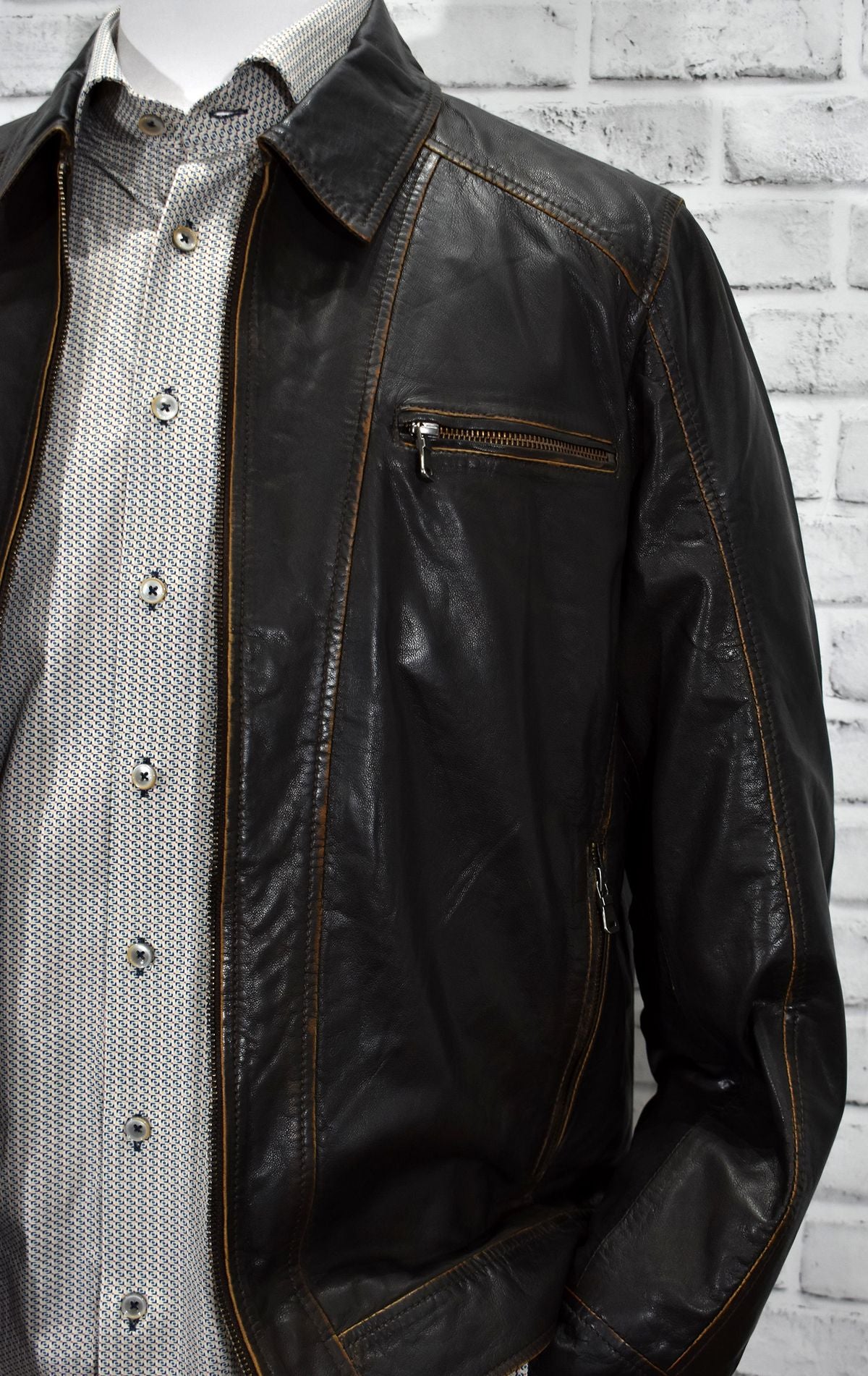 Saturday night out or riding is the best when you have an excellent, soft leather coat with camel raw edges and a soft polo style collar. The look is fashionable yet classic and portrays a celebrity image. Open bottom and open adjustable cuffs for added comfort and style. Classic fit. Biker Leather by Marcello Sport