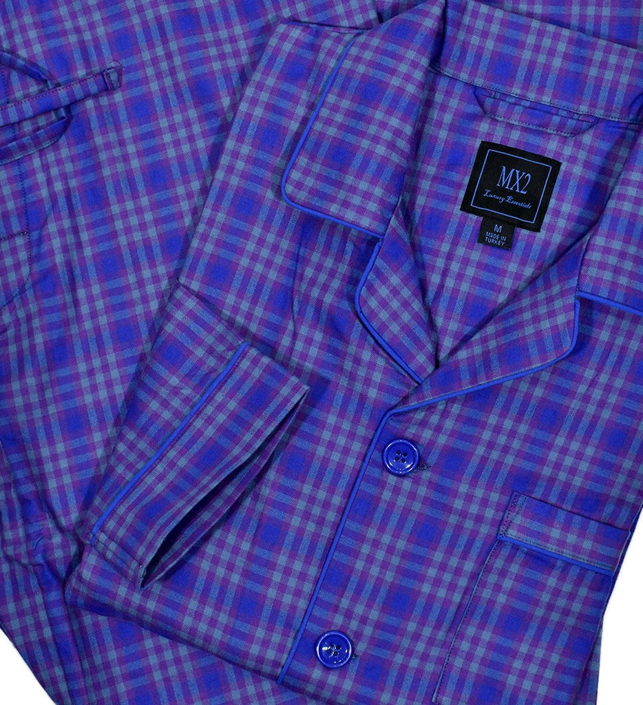 Our exclusive men's pajamas are made with extra fine cotton that is soft to the touch.  The result is a comfortable pajama that enhances your around the house lifestyle.  Soft cotton woven fabric. Traditional fashion pattern. Blue and plum coloration. Classic coat top with pocket, button closure and edge piping.