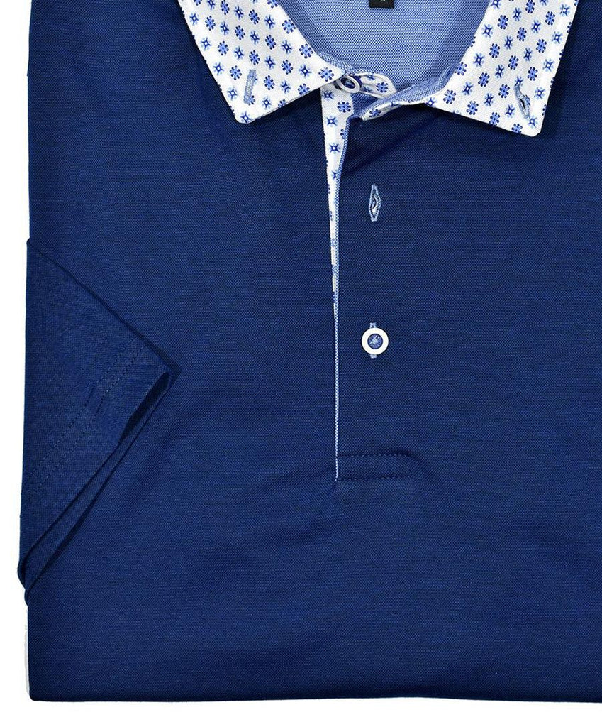 Our newest polo will add a fresh look to your Spring/Summer wardrobe.  As we all get back to normal, these polos will define a new spirit, update your style and image.  Premium cotton fabric with lycra for comfort and complimentary printed collar fabric, custom buttons and piping make these polos a must have.  Modern fit.    Marcello Signature Collar Sport Polo - Indigo Navy