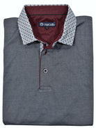 Our newest polo will add a fresh look to your Spring/Summer wardrobe.  As we all get back to normal, these polos will define a new spirit, update your style and image.  Premium cotton fabric with lycra for comfort and complimentary printed collar fabric, custom buttons and piping make these polos a must have.  Modern fit.    Marcello Signature Collar Sport Polo - Charcoal