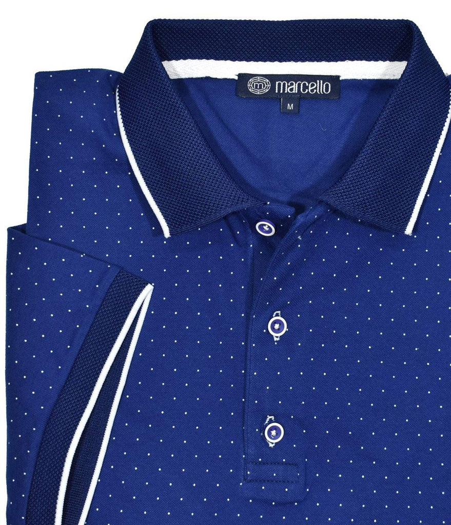 The Wellington polo sports a light weight and soft baby pique fabric that is elegantly rich. Available in navy or white.  Ultimate cotton pique fabric. Updated traditional printed fine dot pattern. Trend collar with contrast detailing. Custom buttons. Modern fit.