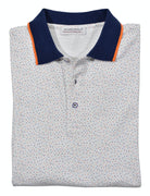 Soft cotton pique, white fabric with a fine color dot print in orange and blue. The sport image is enhanced with a matched collar and custom buttons.  The cotton pique fabric feels and looks beautiful.   Open sleeve model and a classic fit.