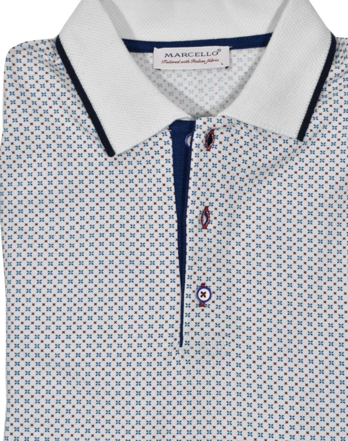 Soft, white, cotton pique fabric sporting a fine small geometric medallion in blue, teal and white colors, that creates a sophisticated clean image perfect for any setting.  Clean collar tipped in contrast color, custom buttons and contrast color fabric along the buttons.  Classic fit.