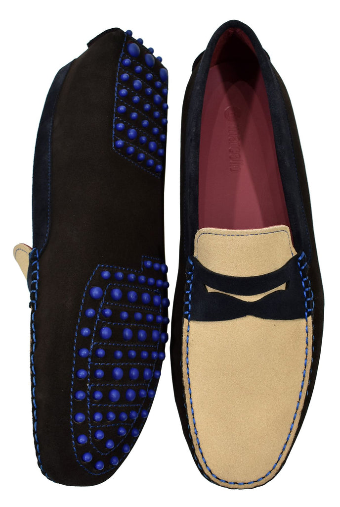 Define style with a mix of chocolate, tan and navy colored fine suede and a cool royal blue bottom dotted sole for added fashion.  The moccasin is a driver model with the bottom sole feature also on the heel.  Classic fit.  Hand crafted in Spain.  Marcello shoes.