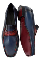 Add life and a hip look to your dress style with our burnished leather shoe in indigo with red accents.  Check out the cool matched red bottom and leather sole. Use this shoe for a casual or dress look to define classic style with an edge. Classic fit.  Hand crafted in Spain. Shoe by Marcello.