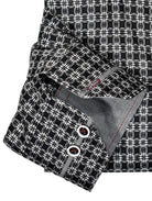 Unica Milano Bricket  Medium check pattern is enhanced with a neat inset pattern. Striking black background with multi color dot pattern. Medium spread collar and custom matched buttons. Classic Shaped fit.