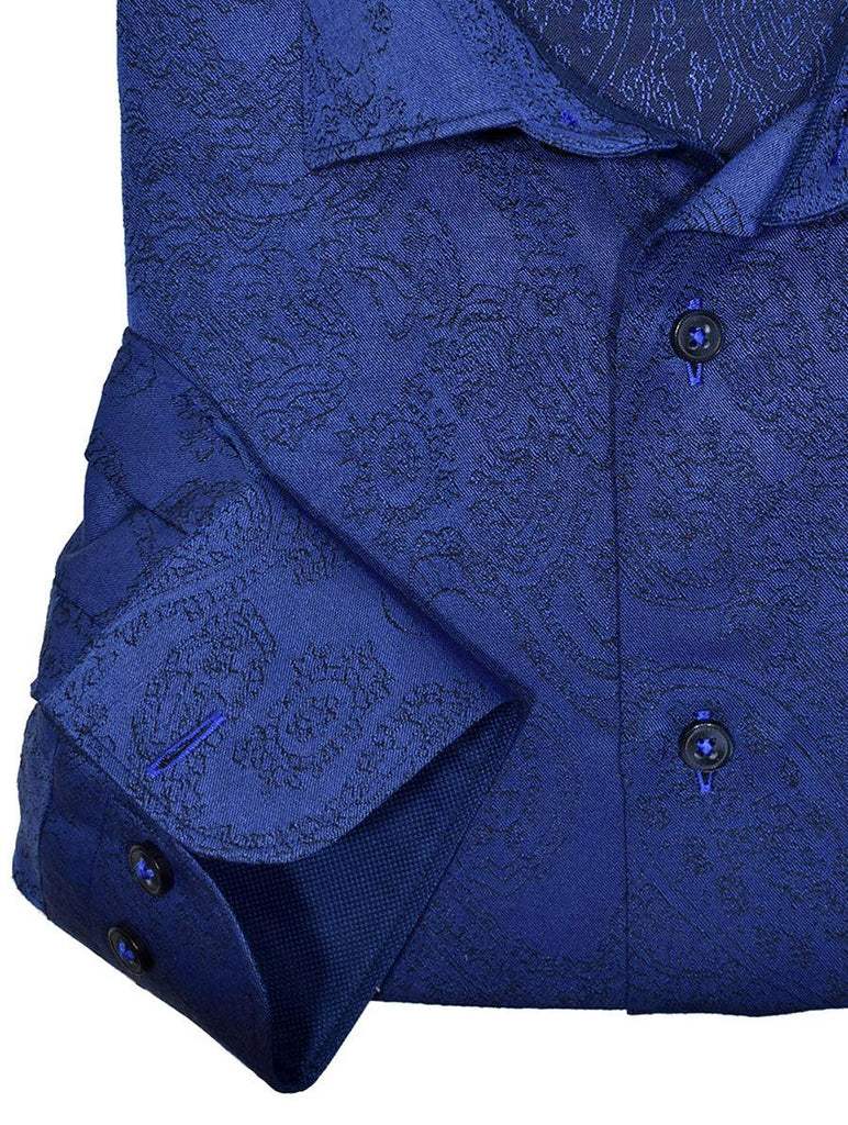 A cool navy shirt sporting a tone on tone paisley pattern will never go out of style and is a must have for any wardrobe.  Cotton fabric. Tonal paisley pattern updates the image. Blue piping details and cuff trim fabric. Contrast stitching and unique buttons. Medium collar. Classic shaped fit.
