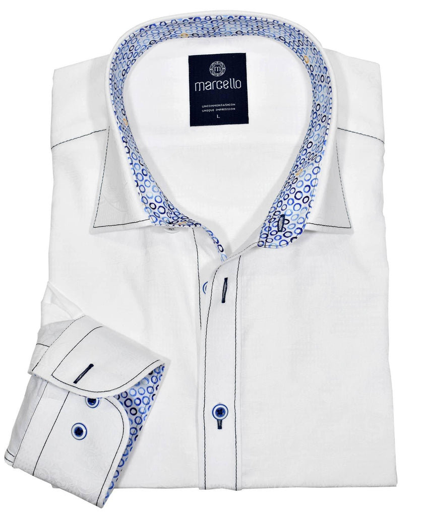 Exclusive soft cotton fabric. Sophisticated tonal paisley pattern. Contrast fashion stitch work. Custom selected buttons. 2 button signature cuffs. Classic shaped fit. Shirt by Marcello Sport