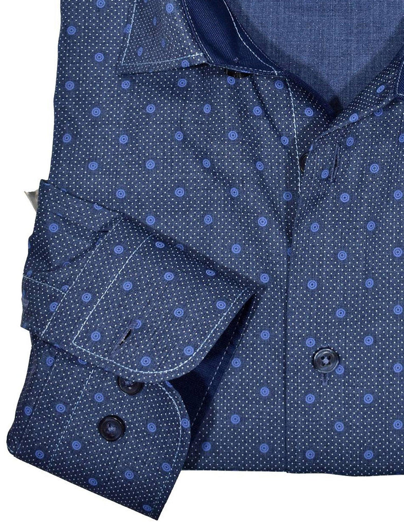 The deep navy color with accent blue and fine white dot pattern takes a traditional look and pattern and adds a fashion flair. Cotton sateen fabric. Contrast white stitch work. Custom matched buttons. Matched denim fabric. Signature two button cuff detail. Medium spread collar. Classic shaped fit. Shirt by Marcello Sport.