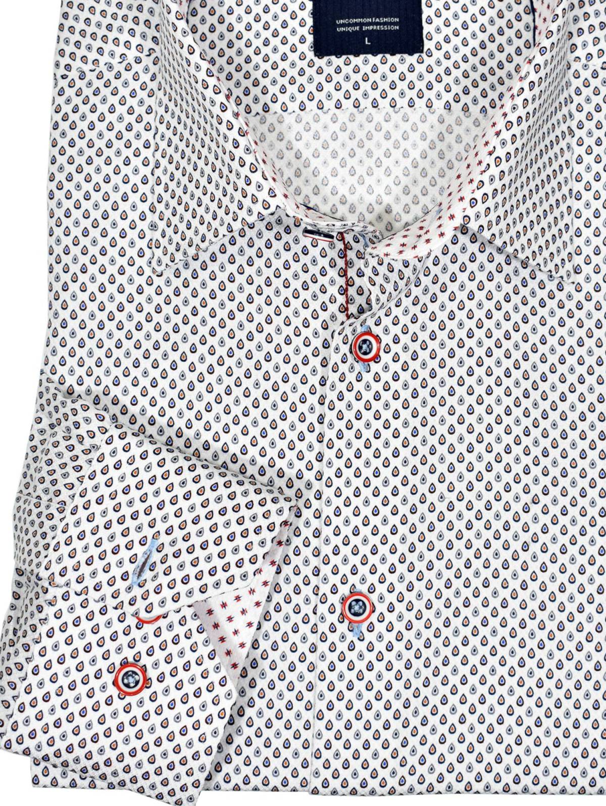 The Marcello exclusive 1 piece roll collar will look significantly better than your normal shirts. Incredible easy care, herringbone fabric feels extra fine and performs well all day.   The cotton fabric with microfiber has a clean teardrop pattern in easy complimentary colors.   Hand selected buttons, contrast stitch detailing and a medium collar. Second cuff placket button for the perfect cuff turn up.  Classic shaped fit, best for a medium build.