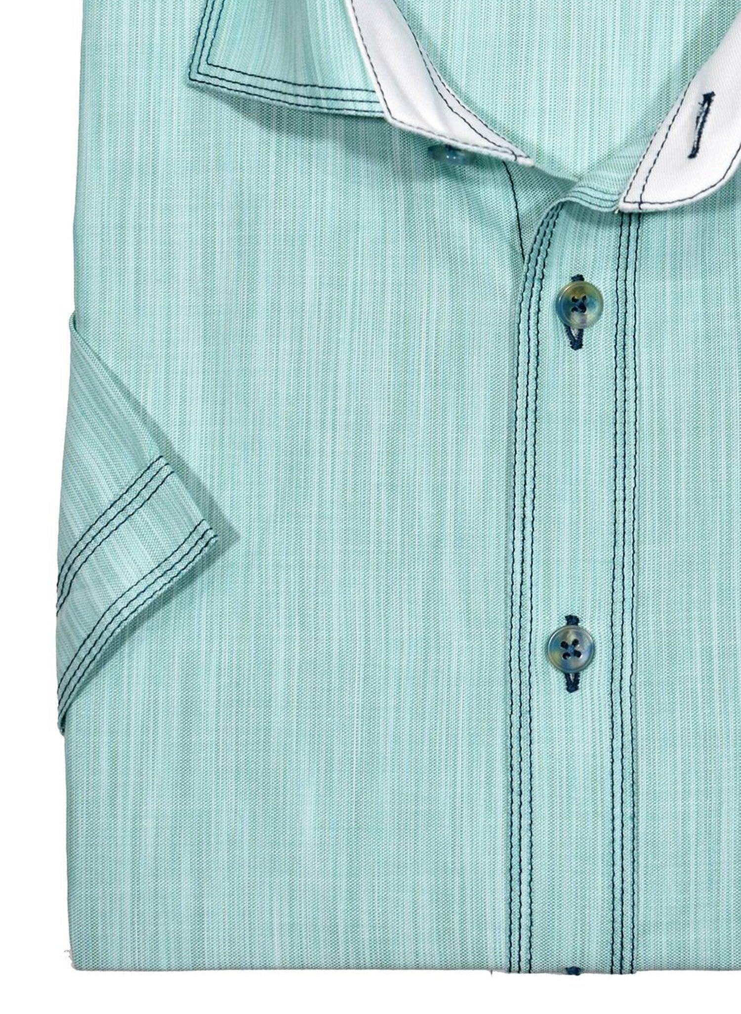Marcello Sport classic short sleeve cotton linen fabric is crafted to reduce wrinkling.  The shirt features our signature triple stitch detailing, matched buttons and complimentary trim fabrics.  Soft cotton blended fabric, woven to look like linen. Medium spread collar for a casual sport look. Trend chest pocket. Square bottom with side slit vents. Classic shaped fit.