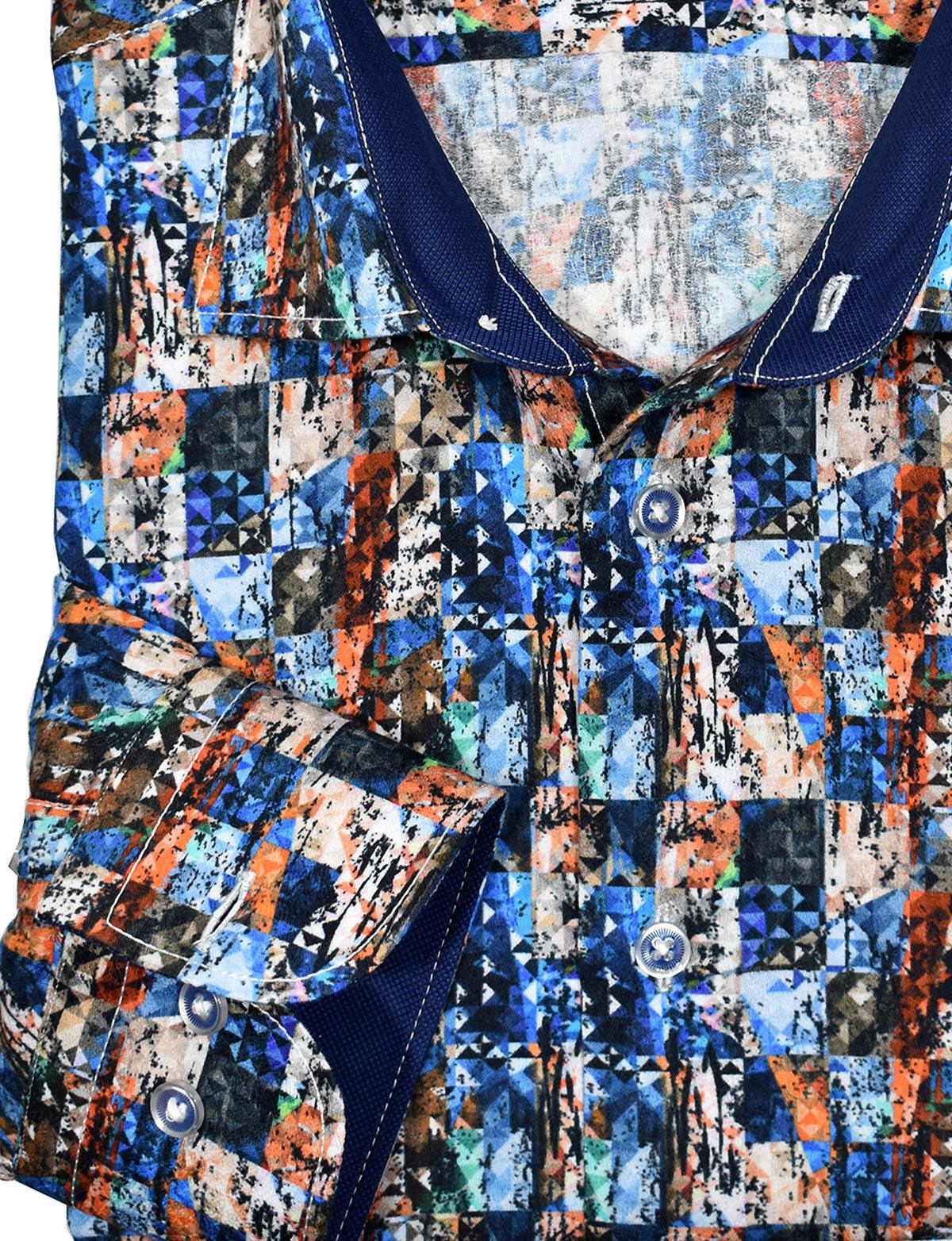 A unique geometric pattern printed over a subtle cotton jacquard fabric to add life to shirt's image. Soft cotton fabric. Custom matched trim fabric and buttons. Medium collar. Two button cuff system for turning up the cuffs. Classic shaped fit. By Marcello Sport