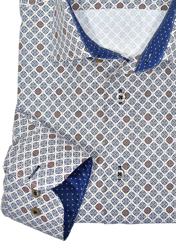 Accentuate you slim style with this updated traditional pattern in warm ecru with navy and mocha accent colors. Soft cotton fabric. Fashion contrast stitching. Custom selected buttons. Two button sleeve system for perfect cuff rollups. Slim fit. Shirt by Marcello Sport.