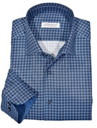 Marcello exclusive 1 piece roll collar shirt is the ultimate in style and sophistication.  The one piece collar stands perfectly and looks great alone or under a sport coat.  You will surely want every one piece roll collar shirt we offer.  Rich cotton / microfiber fabric. Fashion diamond medallion pattern in rich blue colors. Adjustable 2 button cuffs. Unique extra sleeve button to roll cuffs without flaring. Classic shaped fit.