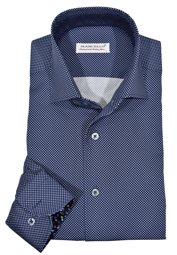 Exclusive Marcello 1 Piece Roll Collar Shirt.  The one piece roll collar stands perfectly and looks fantastic alone or under a sport coat.  The classic navy with sky dot pattern coupled with a rich fabric creates a sophisticated look to set your apart from the rest.  Hand selected buttons, two button cuff placket for the best look when rolling up the cuffs and enhanced stitch detailing.  Classic shaped fit.