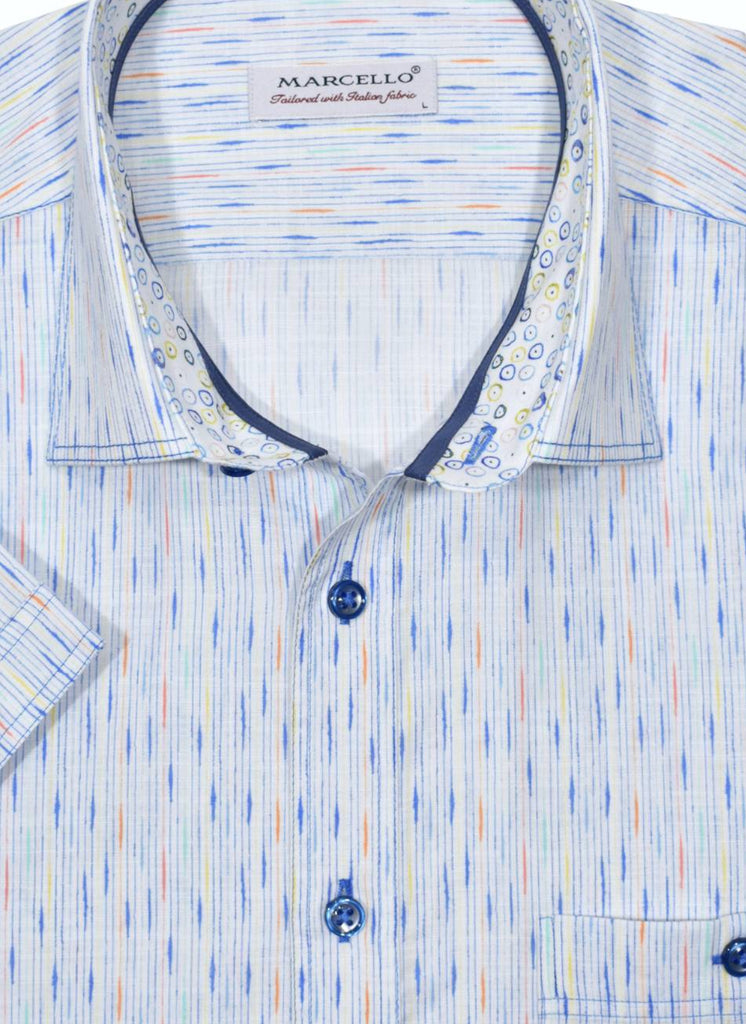 A unique brushed stripe with accentuated colors, on soft cotton fabric, welcomes the Spring/Summer season. To enhance the look the stiching is double track and in a contrast color. Fashion trim fabric, neck piping and a classic buttoned chest pocket add to the look. Classic shaped fit. Shirt by Marcello Sport.