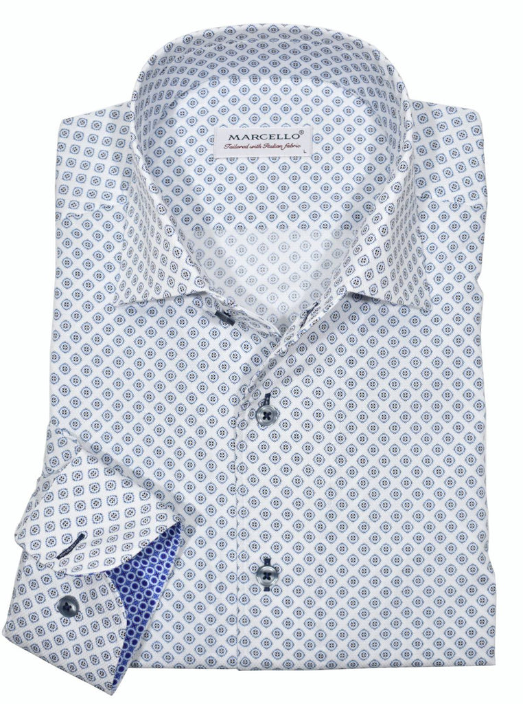 Marcello's exclusive ultra soft, cotton/microfiber herringbone fabric with a soft open medallion pattern mixing blue and dark navy on a white ground. The ever so popular roll collar stands perfectly, sporting a perfect look.  Traditional look at its finest with classic, understated colors to create a strong fashion sense. An excellent choice for any occasion.  Classic shaped fit.