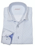 Soft, white textured cotton fabric with an open and linked medallion pattern in light blue with navy accents. The elegant pattern is perfect with this Marcello exclusive, one piece roll collar shirt. The open roll collar is like no other, stands perfectly and looks great on.  Great with dark bottoms or even under a navy sport coat.  SLIM Fit
