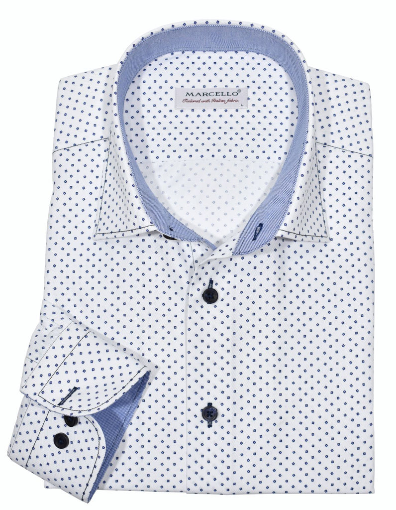 The Marcello open, roll collar is the most sought after item in our collection. The collar stands perfectly and the top button placket does not curl.  Exclusive and rich white tonal herringbone fabric is extra fine and feels fantastic. The small abstract box print is both traditional and contemporary. Contrast navy stitching and matched buttons.  Classic shaped fit.