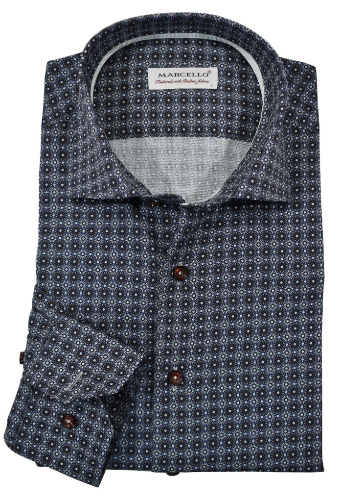 The charcoal and wine medallion pattern with light highlights is an exceptionally rich pattern to foster a debonair image when paired with black or charcoal bottoms.  The fabric is soft to the touch, consisting of cotton with a touch of lycra to provide diagonal stretch. The result is a luxurious feel with a little stretch for added comfort.  Accent silver taping in the neck and down the button placket.  Custom matched buttons.  Classic shaped fit.