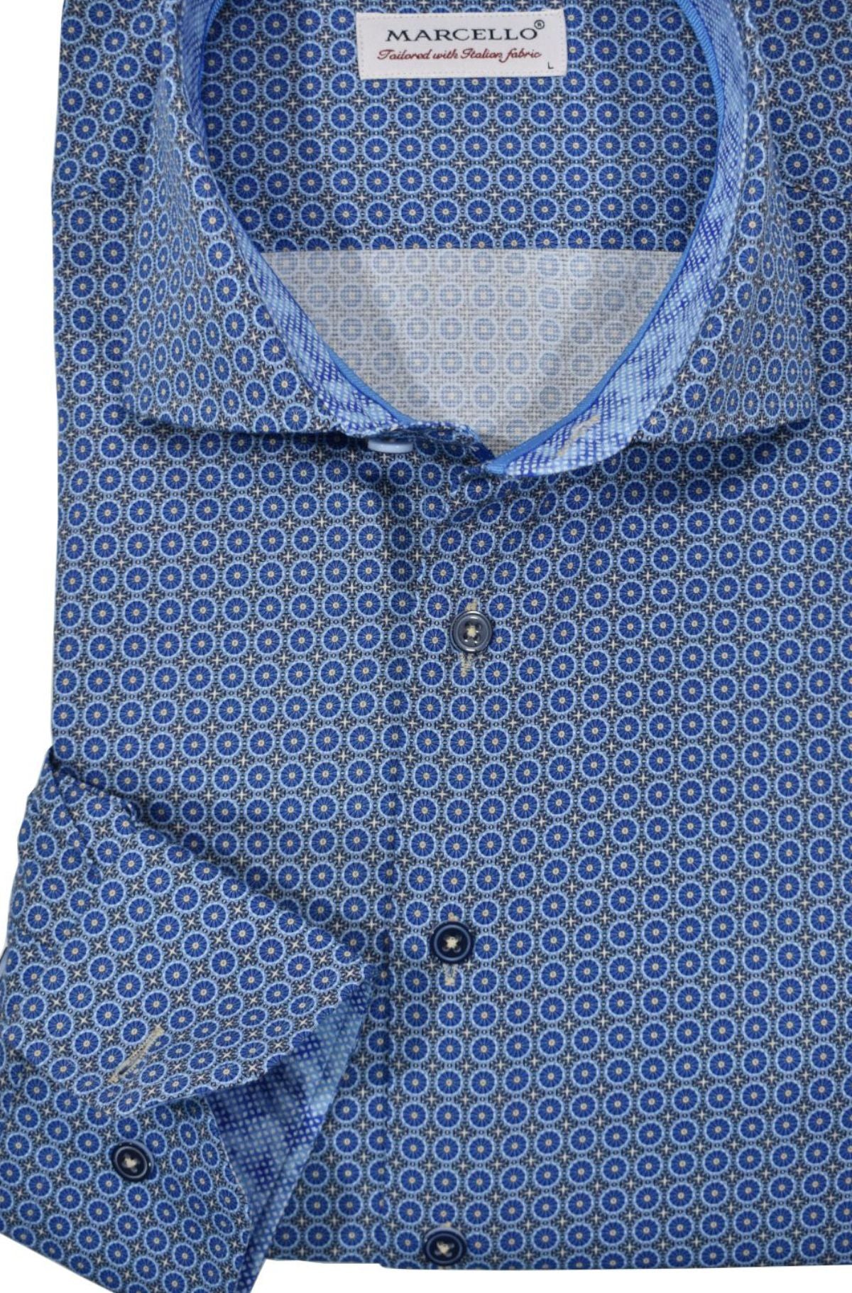 The mixed medallion features an exceptionally rich pattern in shades of blue to for a dress or casual image when paired with many colored bottoms. The bright feel to the shirt pattern creates an upbeat image for a traditional shirt pattern.  The fabric is soft to the touch, consisting of luxe cotton with a touch of lycra to provide diagonal stretch. The result is a luxurious feel with a little stretch for added comfort.