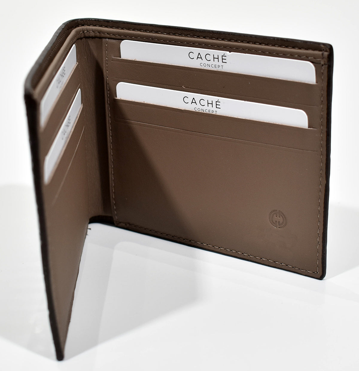 The unmistakable gator pattern stamped on classic leather, with color shading is a great gift idea. Solid leather interior with eight card slots, two hidden slots and a double paper bill section.
